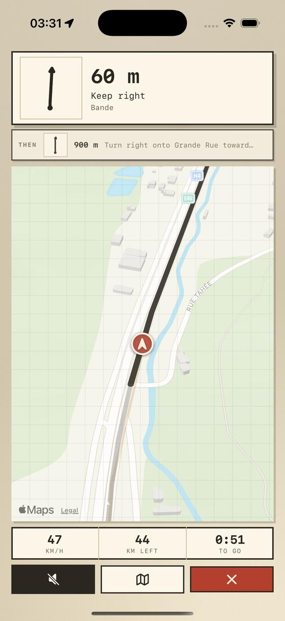 The Roadbook '71 driving screen on the phone during the same drive: the next instruction with its tulip, the distance to the turn, and the heading-up map below.